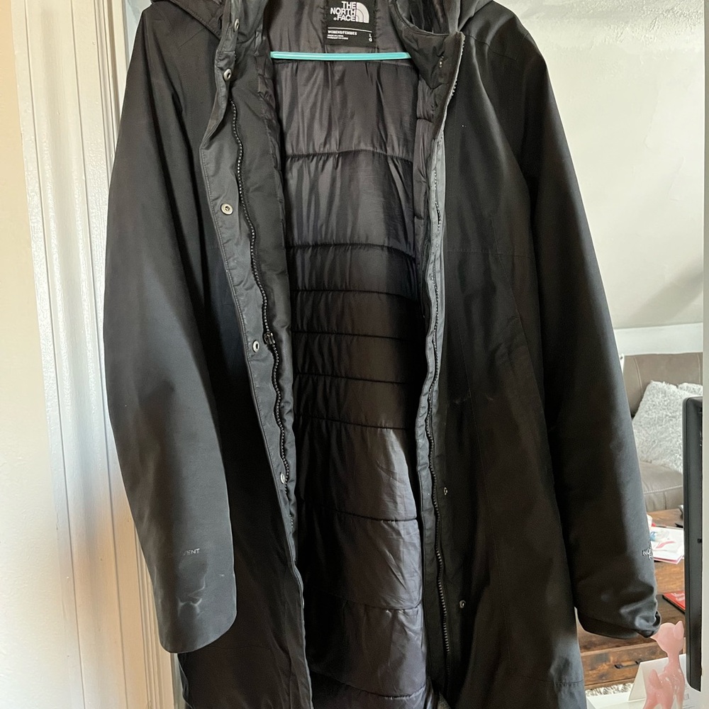 The North Face woman’s  Black Raincoat